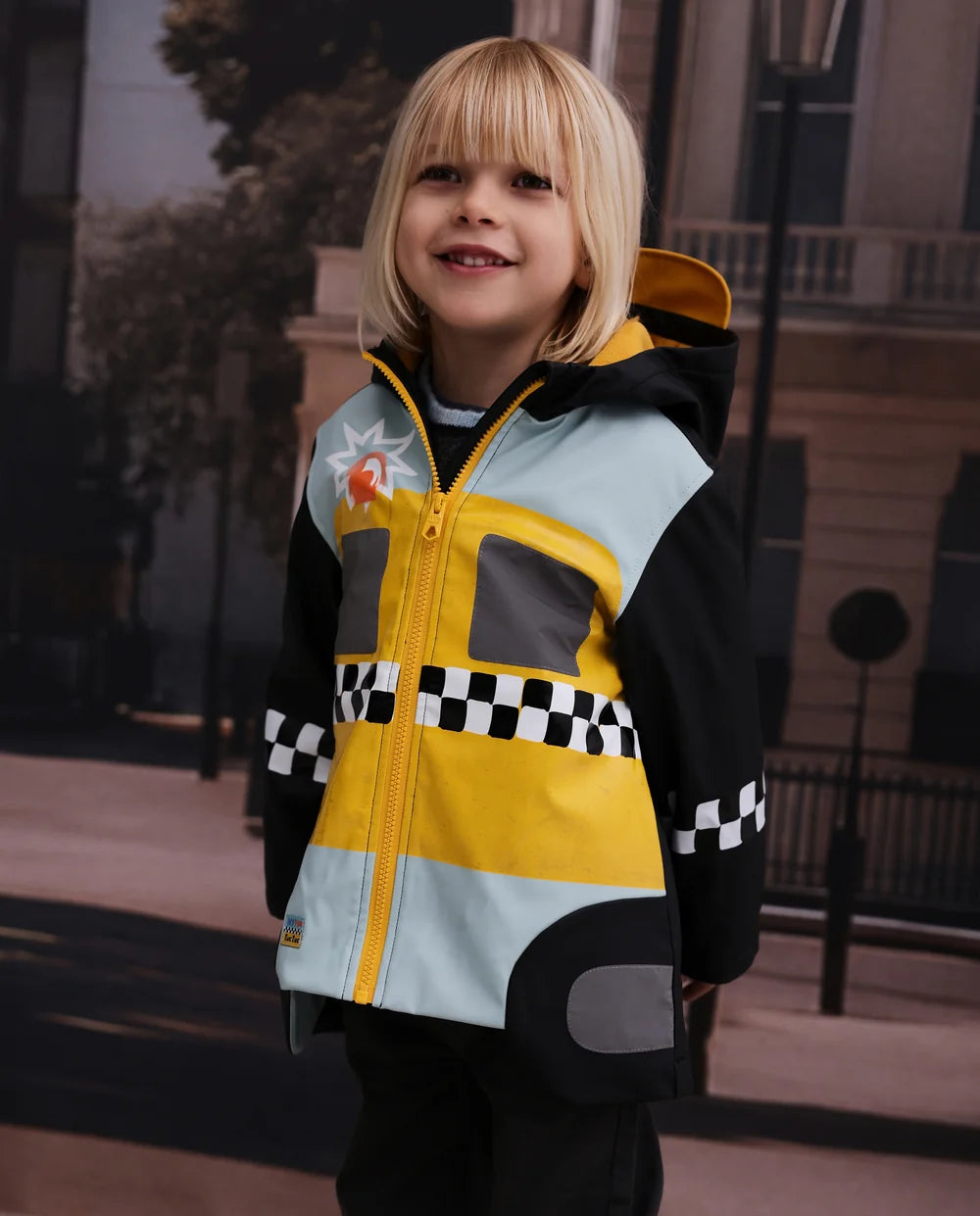 Tuc Tuc - Hooded raincoat with a taxi design